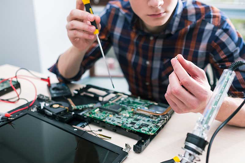 Man Working on Motherboard