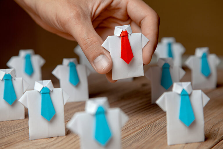Employer chooses takes in hand employee. Leader stands out from crowd. Looking for good worker. HR, HRM, HRD concepts