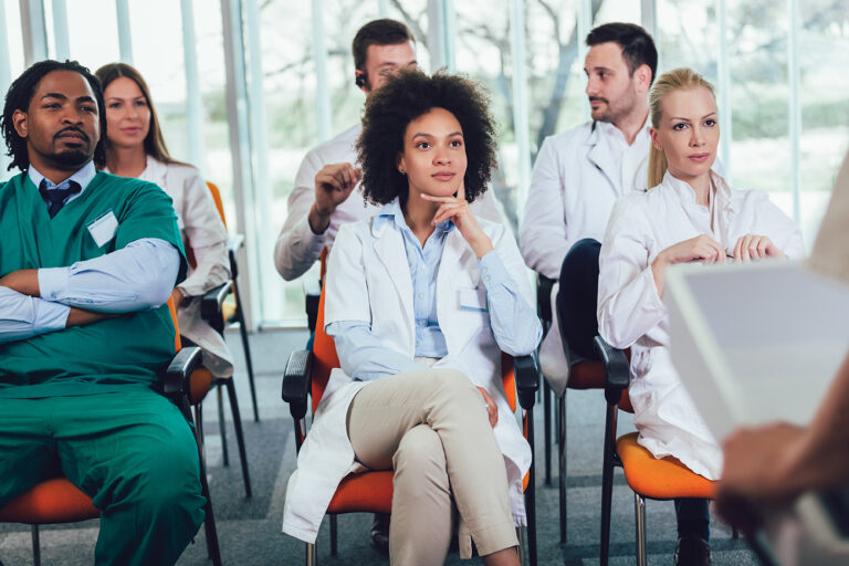 Group of doctors on seminar in lecture hall at hospital. Hospital, profession, people and medicine concept
